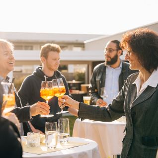 Outdoor networking event on Lake Thun