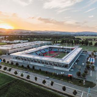 Aerial view of the Stockhorn Arena in Thun at sunset