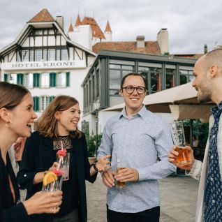 Business drinks reception on the terrace of the Hotel Krone in Thun, overlooking the old town