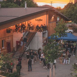 Evening drinks and networking on the terrace of Laube at sunset