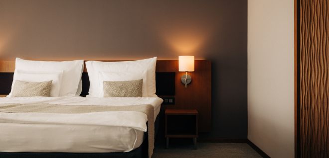 Modern hotel room with a double bed