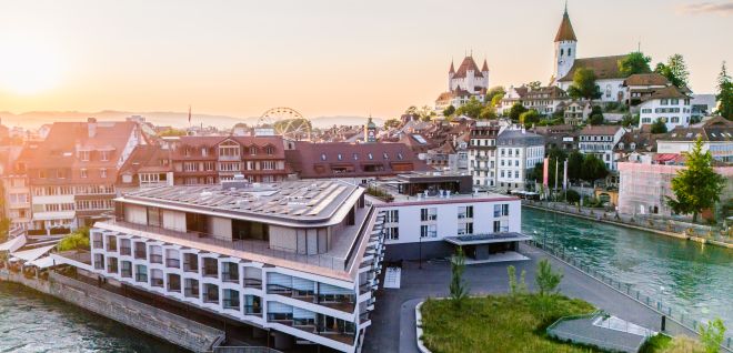 Thun Conference Centre on the banks of the Aare, with views of the old town and the castle church