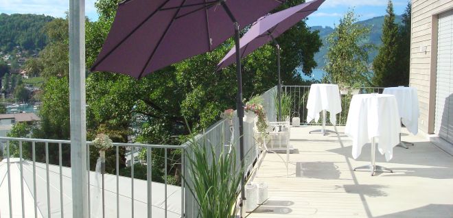Sunny event terrace with lake views