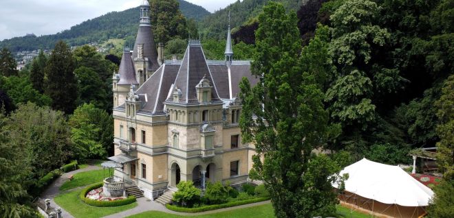 Historic lakeside villa with manicured gardens near Lake Thun, Switzerland